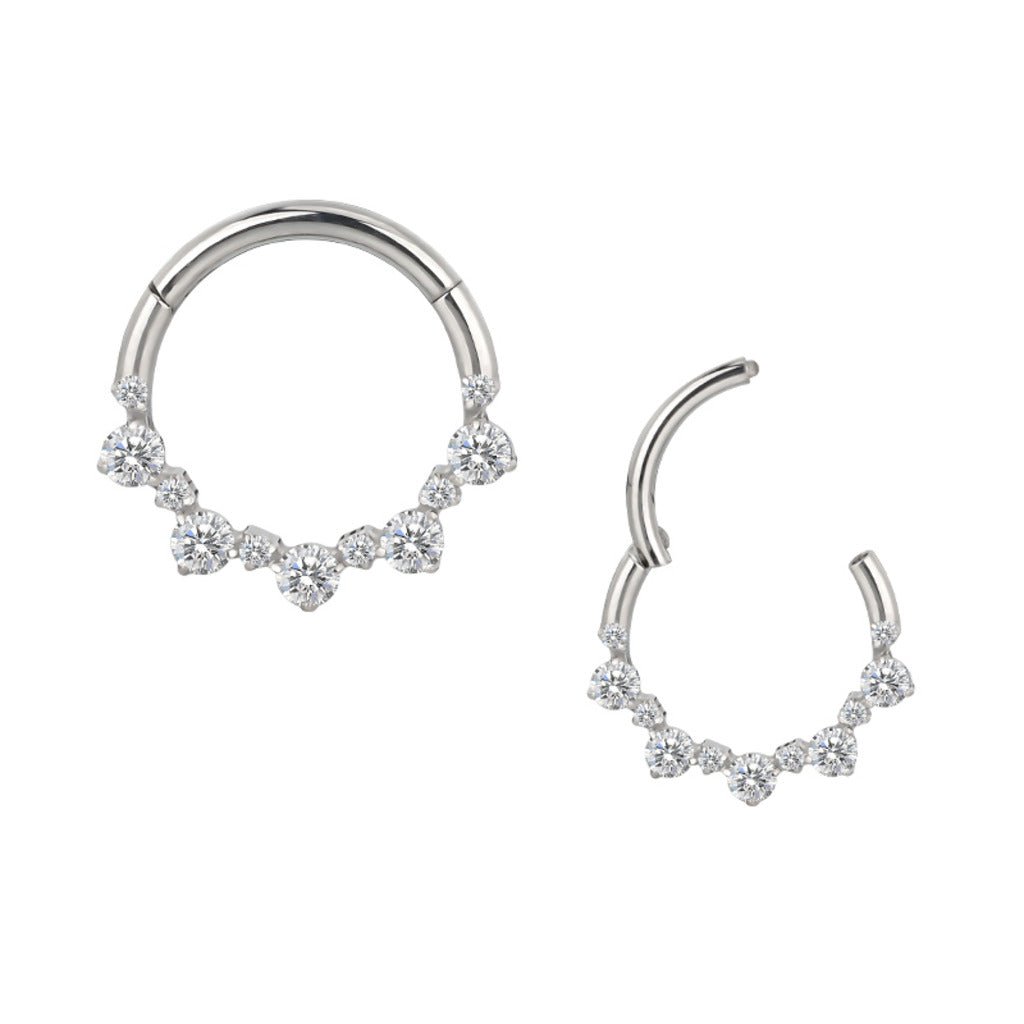 silver-tone titanium round ripple segment ring with clear cubic zirconia stones, shown in a close-up product view on a white background.