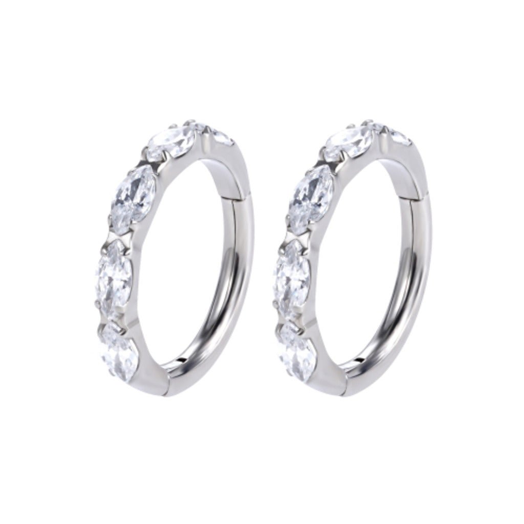 Pair of silver-tone implant-grade titanium hinged hoops set with clear marquise-cut cubic zirconia stones, shown on a white background.