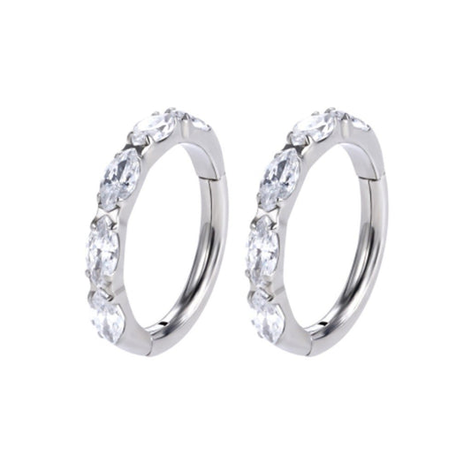 Pair of silver-tone implant-grade titanium hinged hoops set with clear marquise-cut cubic zirconia stones, shown on a white background.