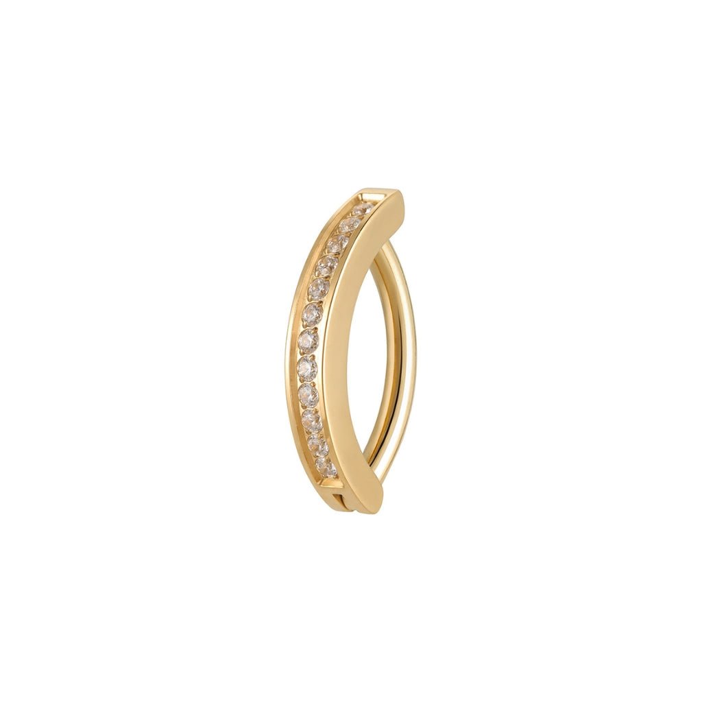 Titanium navel clicker with inset pavé round clear cubic zirconia in gold tone, shown on a white background.