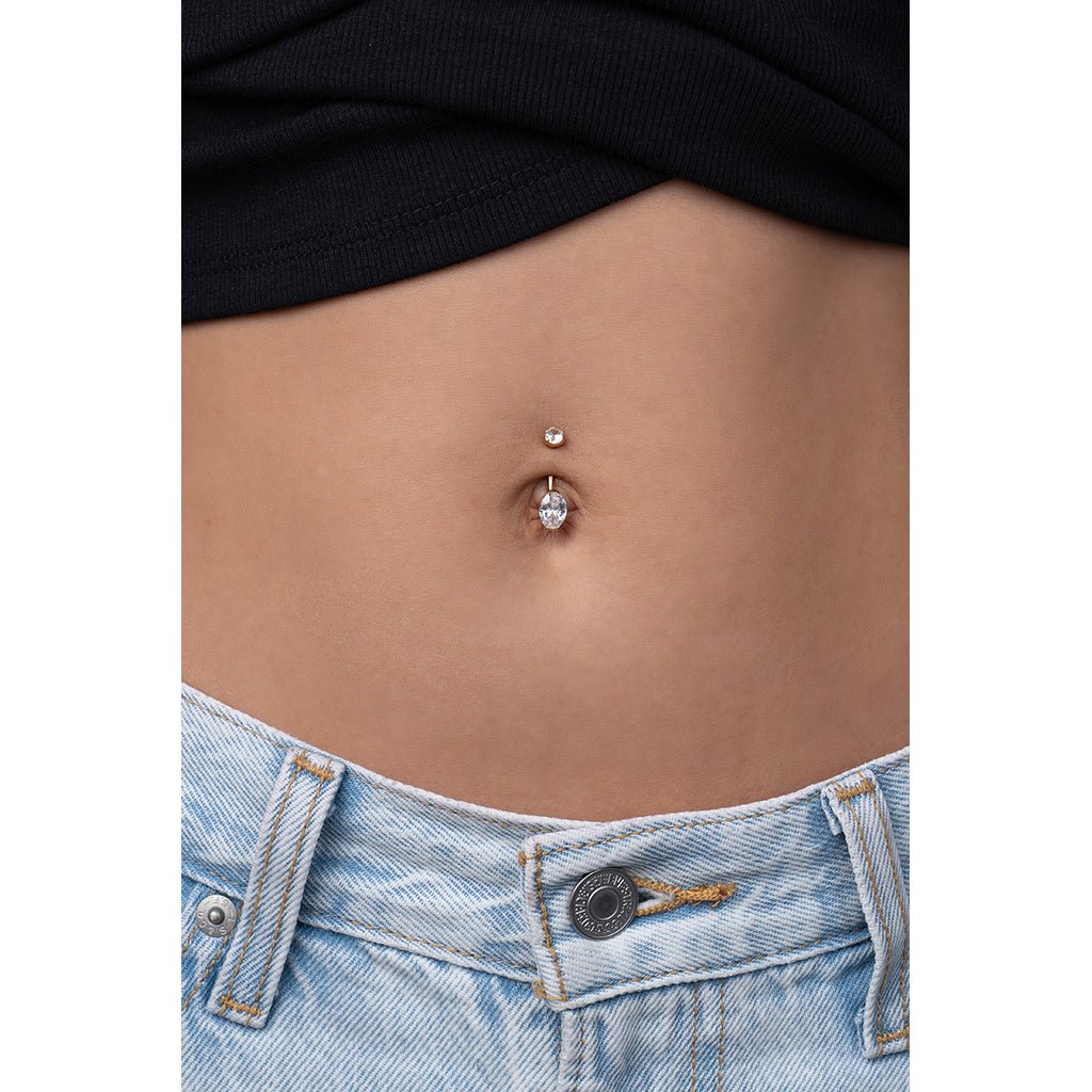 Titanium Navel Bar with Oval Cubic Zirconia in Half - Bezel Arc Setting - SkinKandy | Body Jewellery & Piercing Online Australia