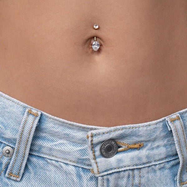 Implant Grade Titanium Navel Bar with Oval Cubic Zirconia in Half-Bezel Arc Setting