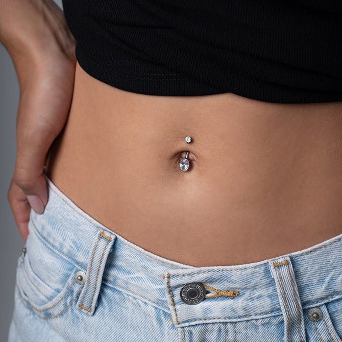 Titanium Navel Bar with Oval Cubic Zirconia in Half - Bezel Arc Setting - SkinKandy | Body Jewellery & Piercing Online Australia