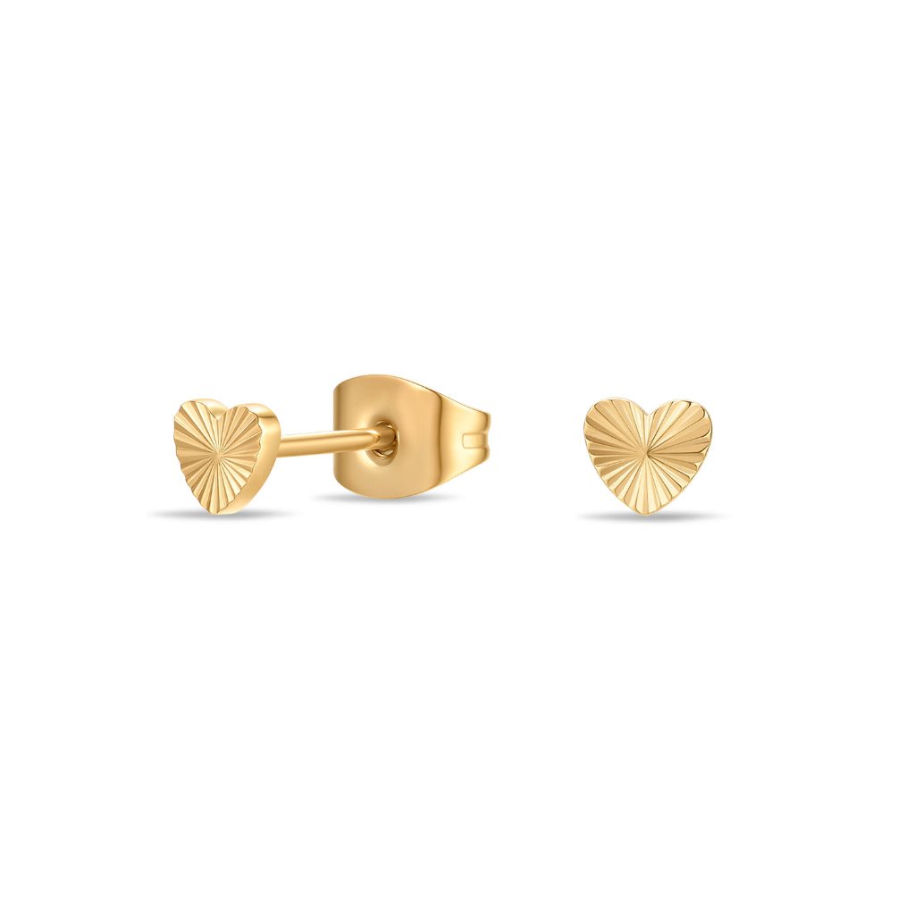 Close-up of surgical steel radiant heart stud earrings in gold tone, shown front-on and side-on to highlight the engraved heart texture and flat-back post design.