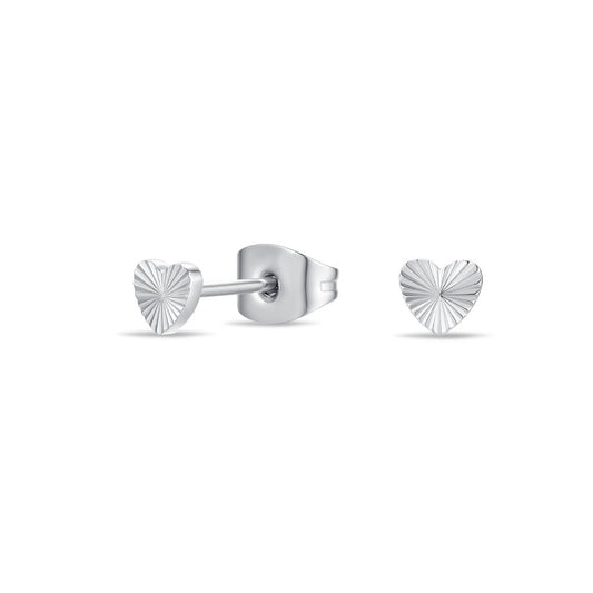 Close-up of surgical steel radiant heart stud earrings in silver tone, shown front-on and side-on to highlight the engraved heart texture and flat-back post design.