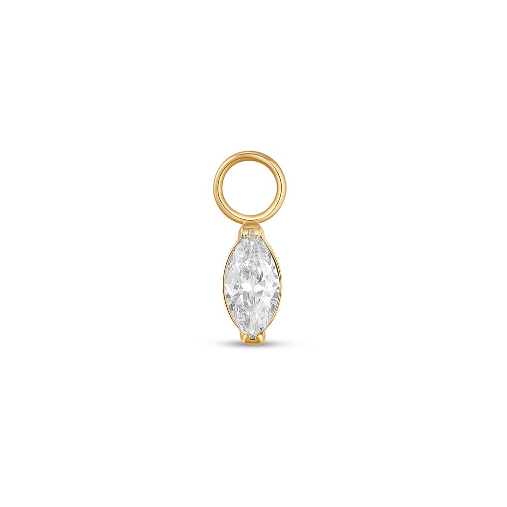 Gold-tone titanium marquis clear cubic zirconia charm with jump ring.