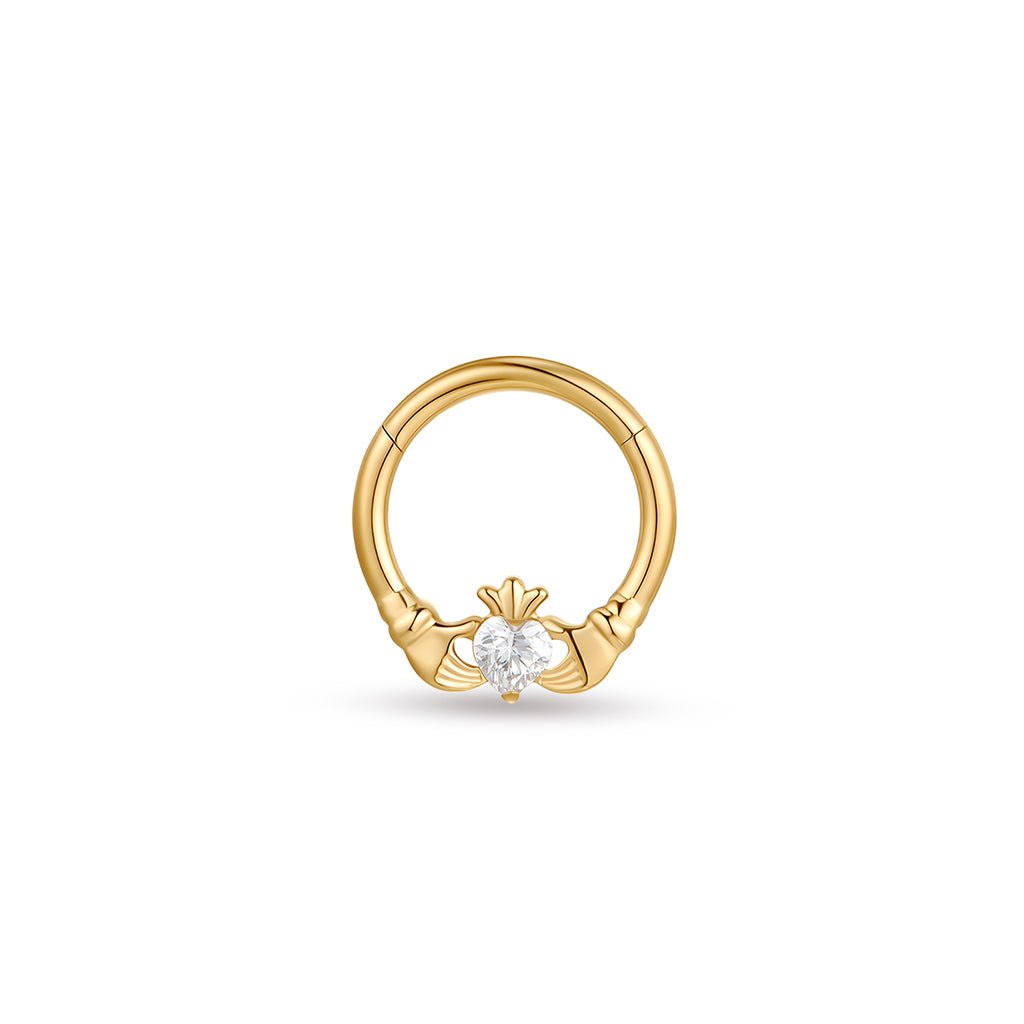 Gold-tone titanium segment ring with two hand heart design and clear cubic zirconia.