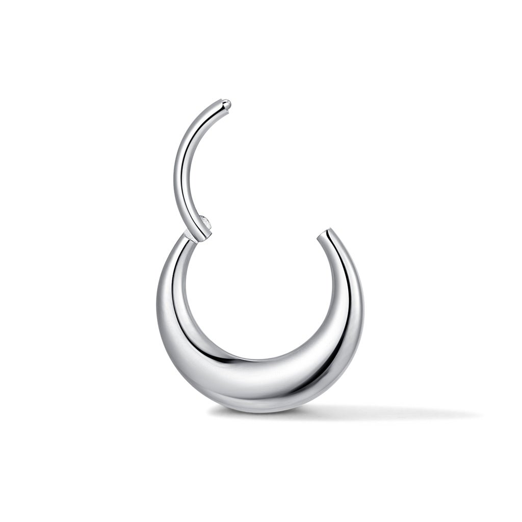 Silver-tone flattened disc segment ring shown open