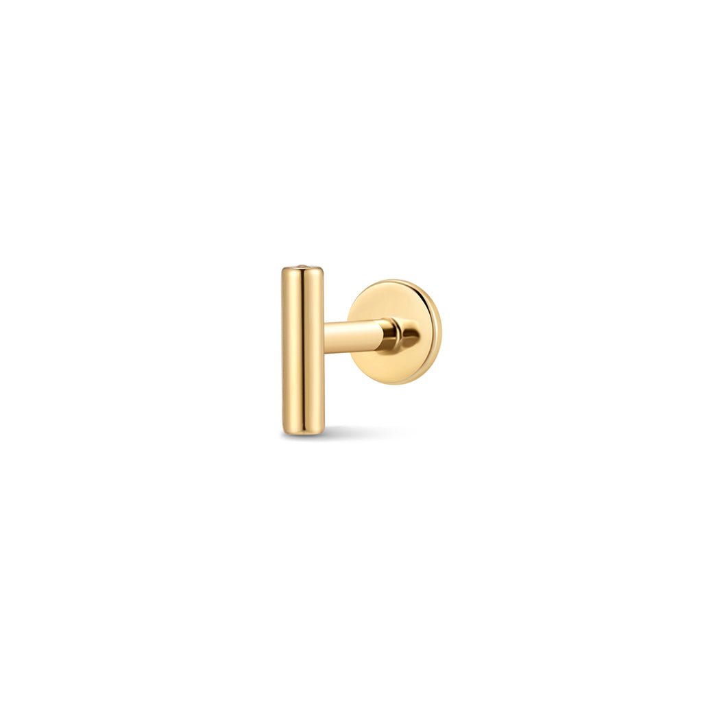 Gold-tone flatback bar stud piercing with straight bar front