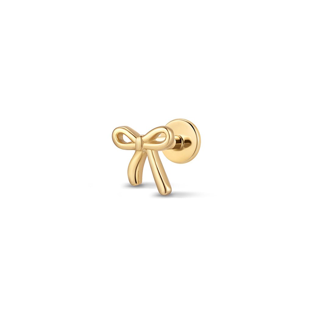 Gold-tone bow flatback piercing with post