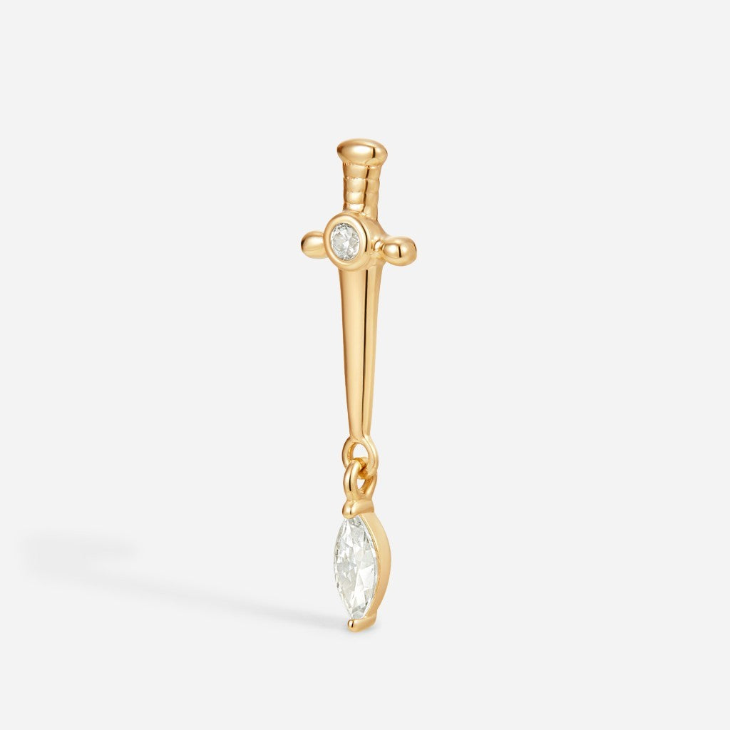 Gold sword dangle flatback stud with clear cubic zirconia detail and marquise-cut gemstone charm in a gothic-inspired piercing design.