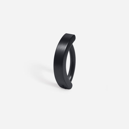 Black titanium curved barbell navel clicker.
