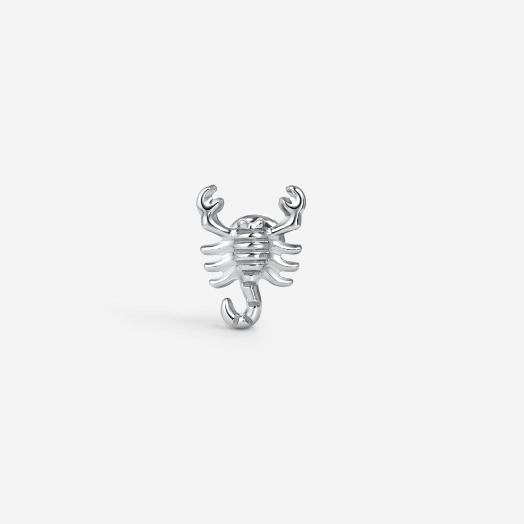 Silver titanium internally threaded scorpion flatback.
