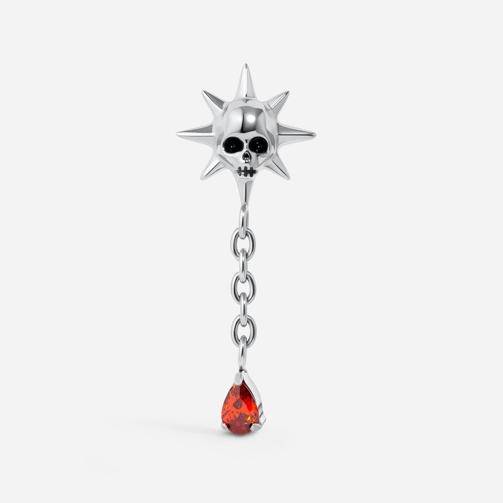 Silver and black tone titanium internally threaded red cubic zirconia skull sun teardrop dangle flatback.
