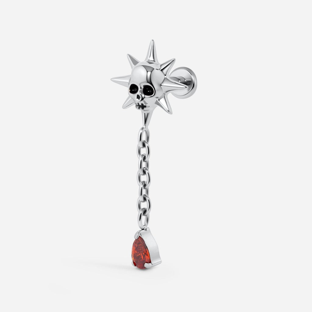 Silver and black tone titanium internally threaded red cubic zirconia skull sun teardrop dangle flatback.
