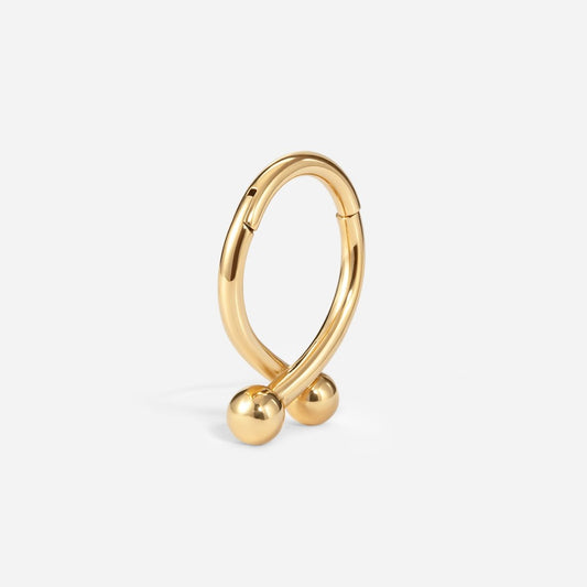 Gold stainless steel twister ball segment ring.
