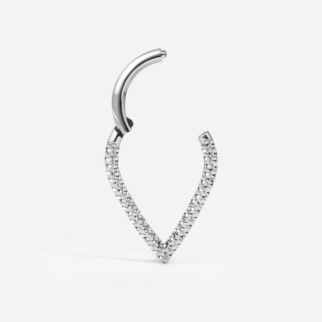 Silver titanium hammered v-shape segment ring.
