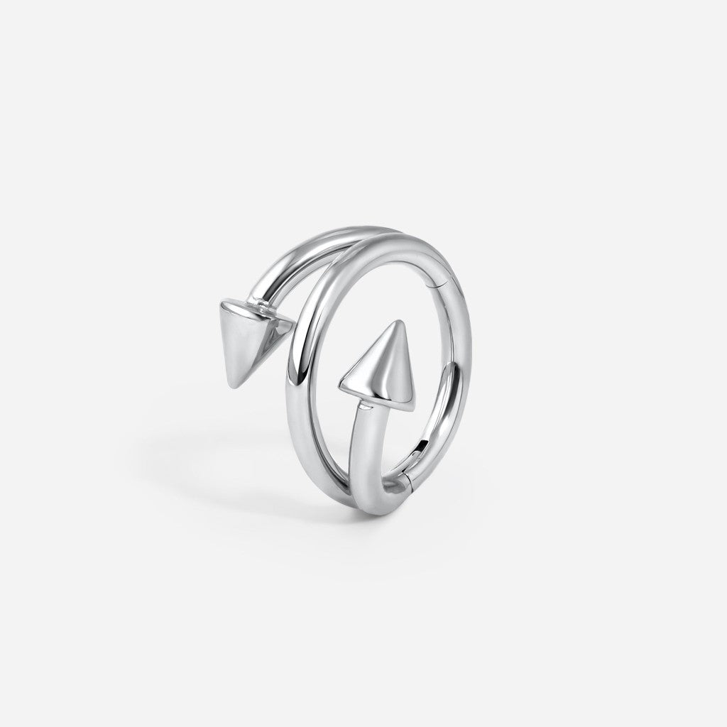 Silver titanium wrap double spike segment ring.
