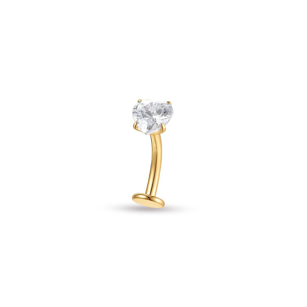 Gold PVD implant-grade titanium floating navel bar with clear heart-shaped cubic zirconia in a claw setting, shown on a white background.