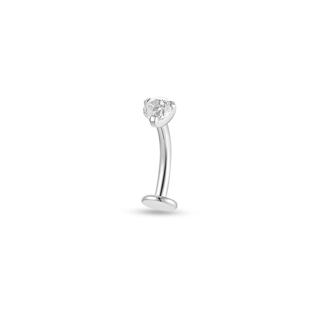 Implant-grade titanium floating navel bar with a clear round cubic zirconia in a claw setting, shown on a white background.