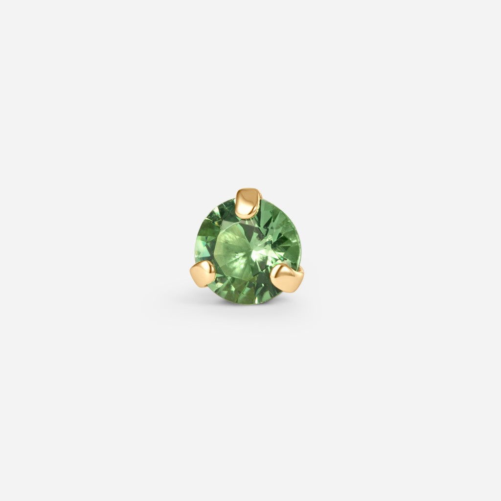 14K gold guided internally threaded top with a claw-set green cubic zirconia stone.