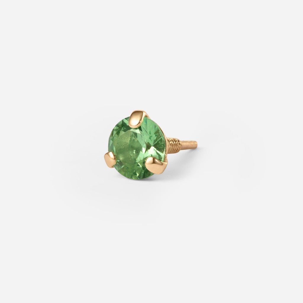 14K gold guided internally threaded top with a claw-set green cubic zirconia stone.