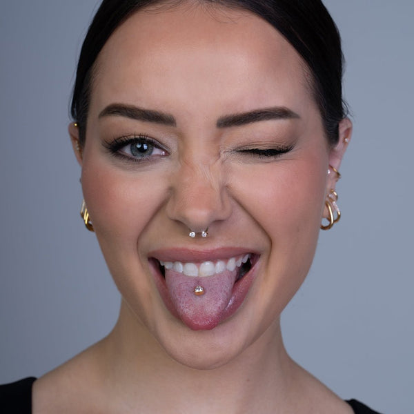 Titanium Internally Threaded Tongue Barbell Heart Cubic Zirconia Top