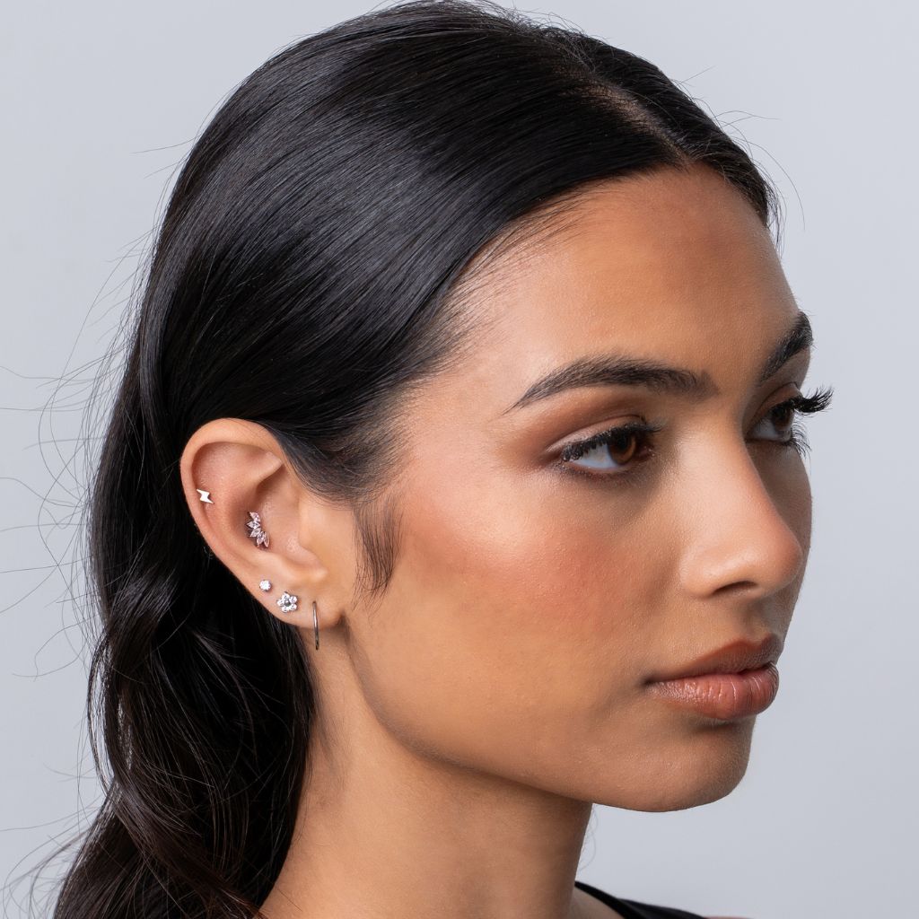 Titanium Internally Threaded Flower Lightning Cubic Zirconia Flashback