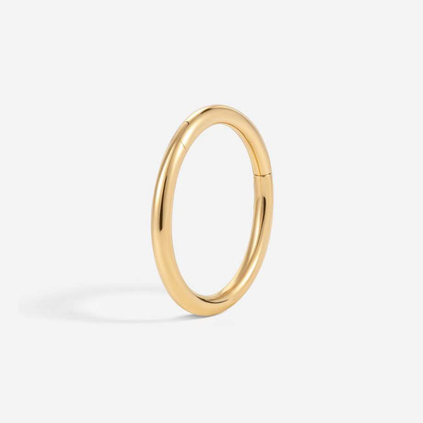 14K solid gold hinged segment piercing ring, closed view