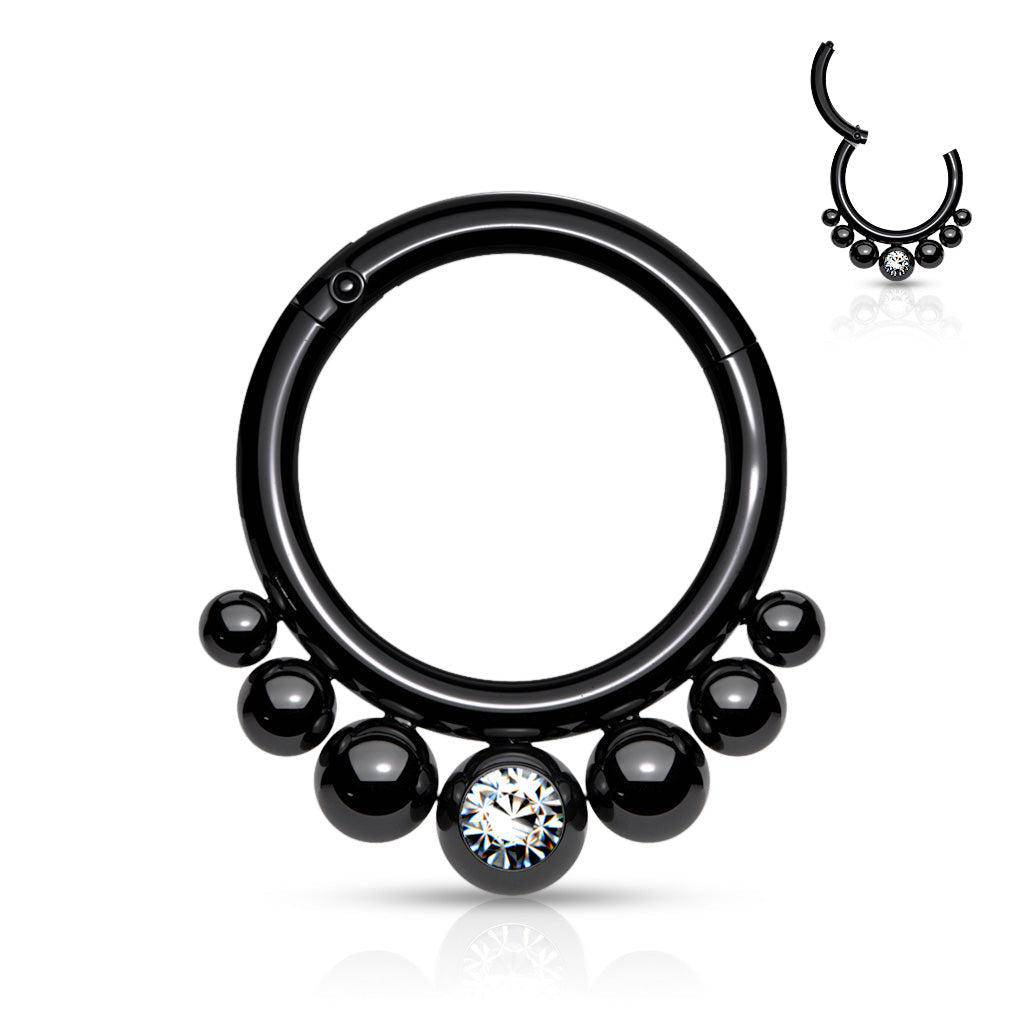 Black segmented hoop ring with crystal center and round bead detailing